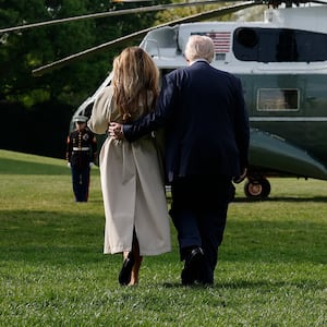 WASHINGTON, DC - APRIL 25: U.S. President Donald Trump and first lady Melania Trump walk to Marine One as they depart the White House on April 25, 2025 in Washington, DC. President Trump and the first lady are traveling to Rome to attend the funeral of Pope Francis. (Photo by Kevin Dietsch/Getty Images)