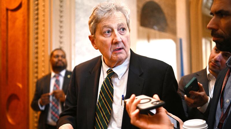 US Senator John Kennedy, Republican of Louisiana, speaks to reporters outside the Senate Chamber ahead of a vote on a foreign aid package at the US Capitol in Washington, DC, on April 23, 2024. The US Senate is due to vote on the final foreign aid package of $95 billion in total military assistance to US allies, including money for Israel and Taiwan alongside the $61 billion earmarked for Ukraine -- is expected to land on President Joe Biden's desk for his approval by the end of the week. (Photo by Mandel NGAN / AFP) (Photo by MANDEL NGAN/AFP via Getty Images)