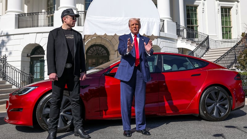 Trump and Musk during a photo-op with a Tesla at the White House in March.