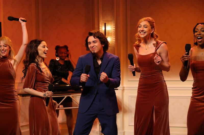Sarah Sherman, host Ariana Grande, Marcello Hernández as Domingo, Heidi Gardner, and Ego Nwodim during the Bridesmaid Speech sketch on Saturday, October 12, 2024