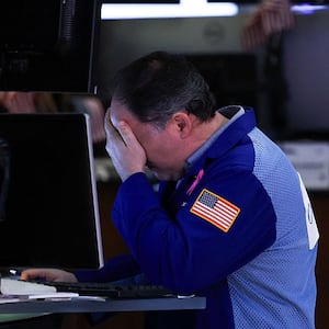 A trader works on the floor of the New York Stock Exchange (NYSE) at the opening bell in New York City, on April 16, 2025.