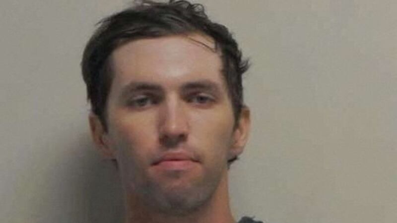 A police mugshot shows Tyler Robinson, the suspect in the fatal shooting of U.S. conservative commentator Charlie Kirk