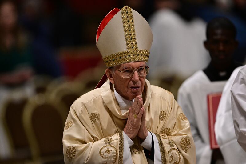 Cardinal Giovanni Battista Re presides over the Easter vigil at St. Peter's Basilica on April 19.