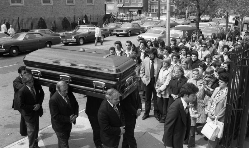 The funeral service for Valentina Suriani, a murder victim of "Son of Sam" serial killer David Berkowitz, takes place on April 21, 1977, at St. Theresa's Church in the Bronx borough of New York City.