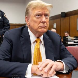 Former US President Donald Trump (C) at the defendant’s table with his attorney Todd Blanche (R) during his criminal trial at New York State Supreme Court in New York, New York, USA, 21 May 2024. Trump is facing 34 felony counts of falsifying business records related to payments made to adult film star Stormy Daniels during his 2016 presidential campaign.     JUSTIN LANE/Pool via REUTERS