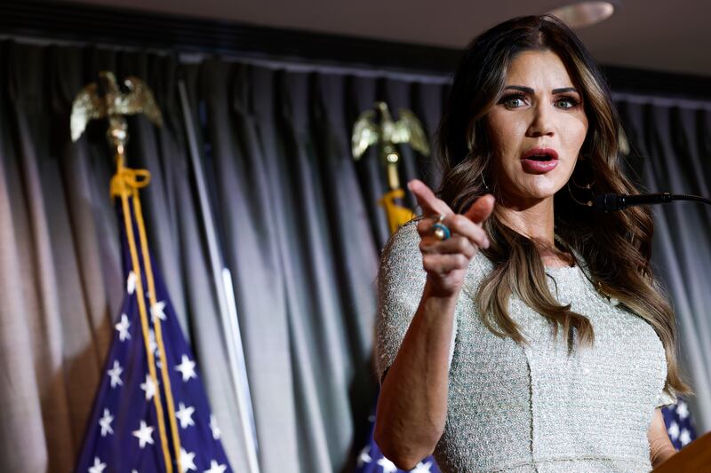 Kristi Noem points as she speaks at the Calvin Coolidge Foundation conference at the Library of Congress on February 17, 2023 in Washington, DC.
