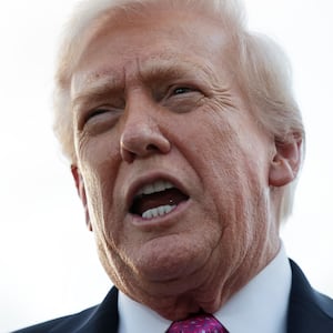 WEST PALM BEACH, FLORIDA - OCTOBER 17: U. S. President Donald Trump speaks to members of the press after he landed at West Palm Beach International Airport on October 17, 2025 in West Palm Beach, Florida. President Trump is spending his weekend at Mar-a-Lago in Palm Beach, Florida.  (Photo by Alex Wong/Getty Images)