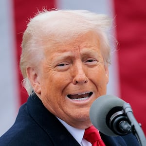 WASHINGTON, DC - APRIL 02: U.S. President Donald Trump holds up a chart while speaking during a “Make America Wealthy Again” trade announcement event in the Rose Garden at the White House on April 2, 2025 in Washington, DC. Touting the event as “Liberation Day”, Trump is expected to announce additional tariffs targeting goods imported to the U.S. (Photo by Chip Somodevilla/Getty Images)