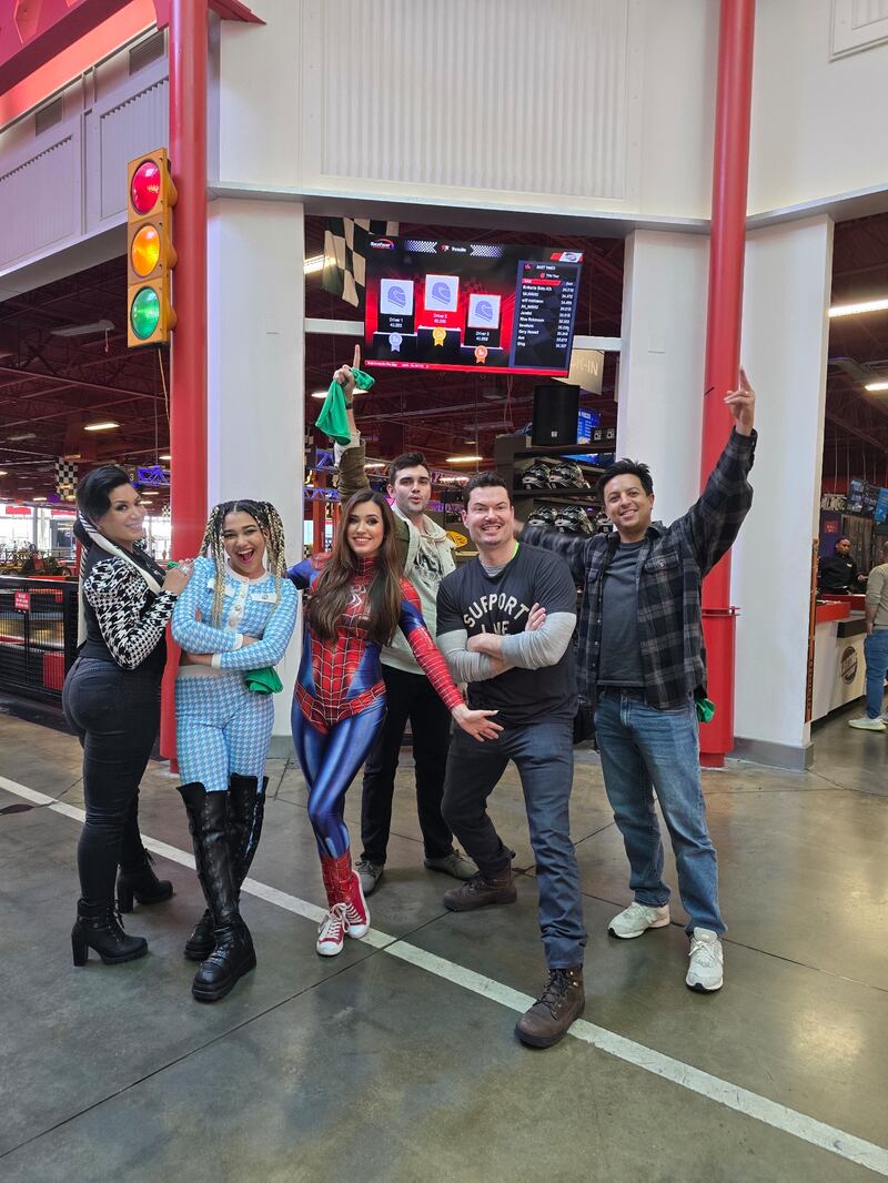 Disney stars Anthony Pyatt, Sam Horrigan, and Brandon Baker pose with Melina Perez, Liberty Barros, and Maddie Mason to celebrate after a kart race at Dezerland Park.