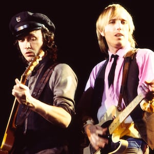 Mike Campbell and Tom Petty of the group Tom Petty and the Heartbreakers, perform during a concert.