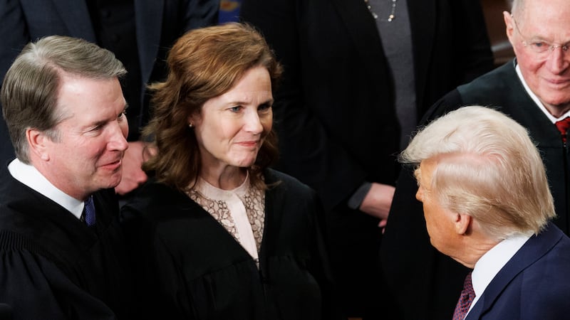WASHINGTON, MARCH 4: President Donald Trump greets Supreme Court Justices Brett Kavanaugh, Amy Coney Barrett and Stephen Breyer during a joint session of Congress on Capitol Hill in Washington, on March 4, 2025. (Photo by Tom Brenner for The Washington Post via Getty Images)
