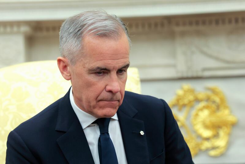 Canadian Prime Minister Mark Carney attends a meeting with U.S. President Donald Trump in the Oval Office at the White House on May 6, 2025 in Washington, DC. Carney, who was elected into office last week, is expected to meet with President Trump to discuss trade and the recent tariffs imposed on Canada.