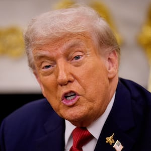 President Donald Trump wears a fighter jet lapel pin during a meeting with President of Turkey Recep Tayyip Erdogan in the Oval Office at the White House on September 25, 2025 in Washington, DC. Trump has signaled that the U.S. might lift a ban on F-35 sales to Turkey during Erdogan's first visit to the White House since 2019. (Photo by Andrew Harnik/Getty Images)