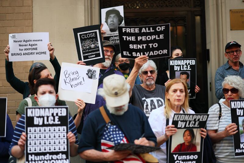 Demonstrators gather to protest against the deportation of immigrants to El Salvador