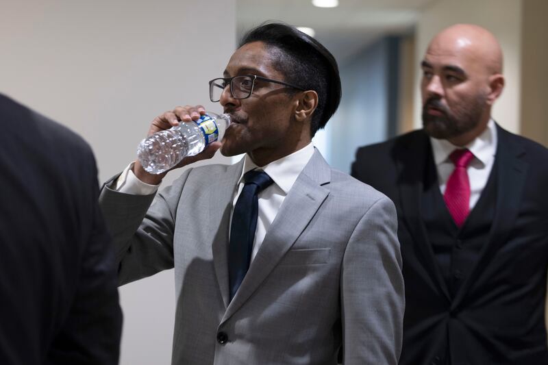 Ali Alexander in a House office building during his Jan 6 closed-door deposition.