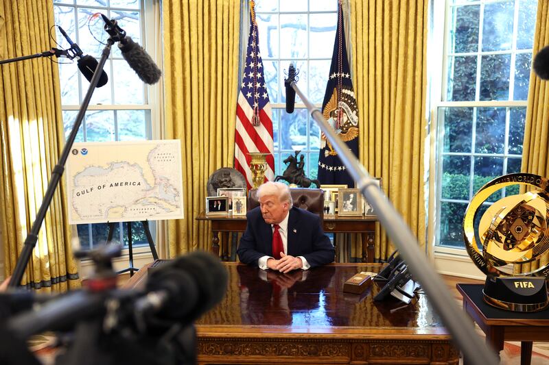 WASHINGTON, DC - MARCH 26: U.S. President Donald Trump speaks to the press next to a map of the "Gulf of America" after signing an executive order in the Oval Office of the White House on March 26, 2025 in Washington, DC. President Trump announced 25% tariffs on all foreign-made cars. (Photo by Win McNamee/Getty Images)