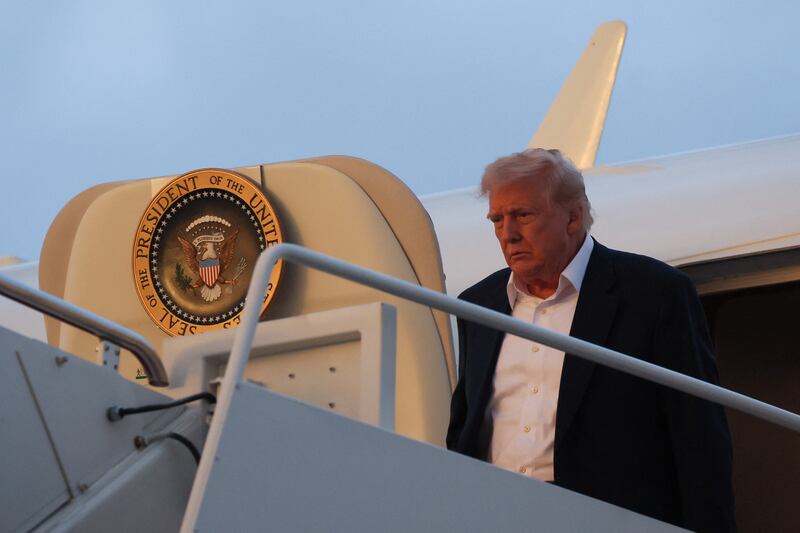 U.S. President Donald Trump exits Air Force One upon arriving at Joint Base Andrews, while on his way back to the White House after a weekend in West Palm Beach, Florida, at Joint Base Andrews in Maryland, U.S., May 4, 2025. REUTERS/Leah Millis