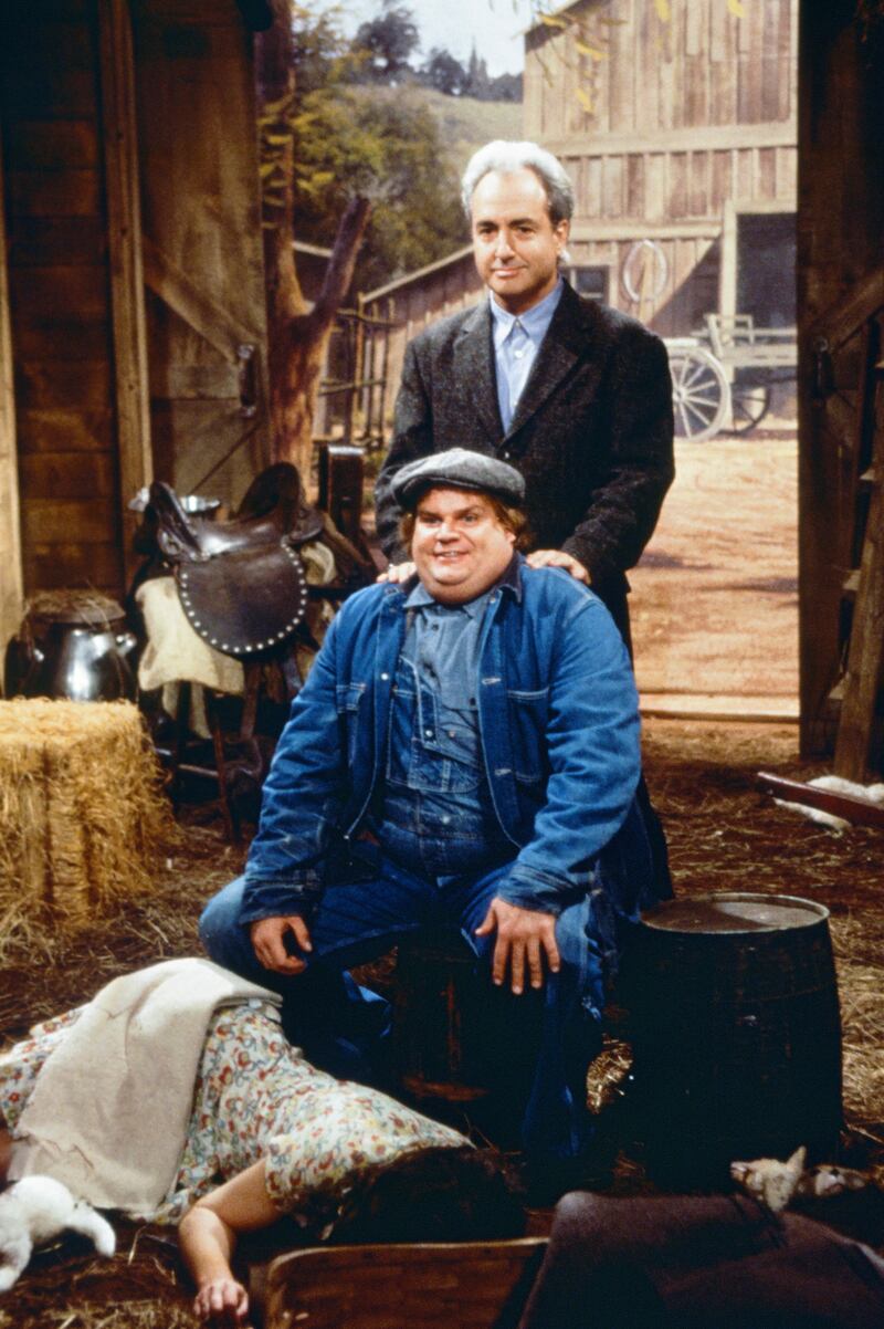 SATURDAY NIGHT LIVE -- Episode 4 -- Pictured: (l-r) Chris Farley as Lennie, Lorne Michaels during "Of Mice and Men" skit on October 23, 1993 (Photo by Al Levine/NBCU Photo Bank/NBCUniversal via Getty Images via Getty Images)