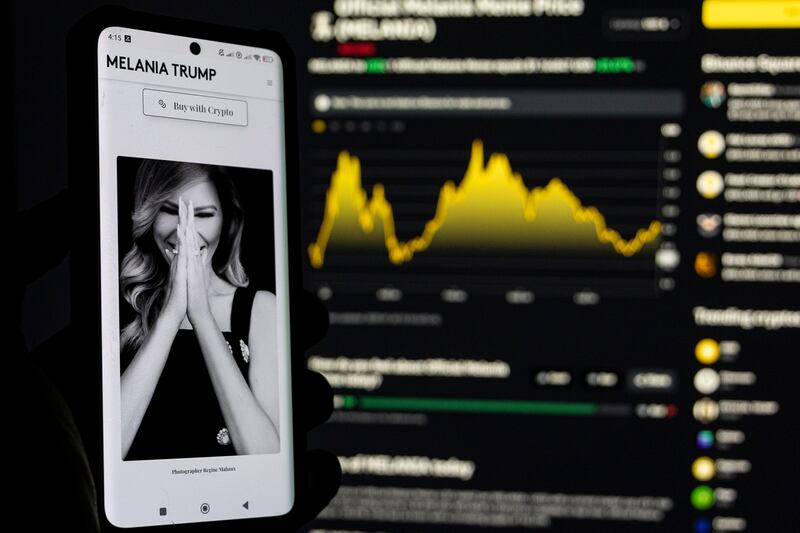 Photo illustration of Melania Meme, a memecoin launched by Melania Trump displayed on a smartphone and a computer screen with the current price charts showed from Binance cryptocurrency exchange page. January 20, 2024 in Amsterdam, the Netherlands  (Photo by Nicolas Economou/NurPhoto via Getty Images)