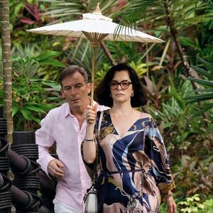 Jason Isaacs and Parker Posey