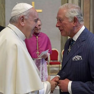 King Charles (then Prince of Wales) shakes hands with Pope Francis during the canonization of Cardinal Newman at St. Peter's Square in 2019 in Vatican City, Vatican.