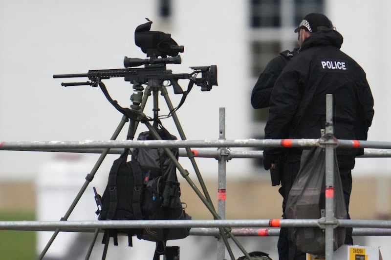 Police snipers are positioned on the roof of the Trump Turnberry hotel.