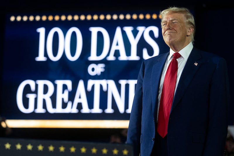Trump’s Tuesday rally was decorated with a number of signs proclaiming how successful he is, including one that read: “100 DAYS OF GREATNESS.”
