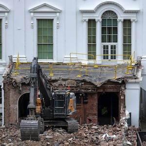 WASHINGTON, DC - OCTOBER 28: An excavator sits on the rubble after the East Wing of the White House was demolished on October 28, 2025 in Washington, DC. The demolition is part of U.S. President Donald Trump's plan to build a ballroom on the eastern side of the White House. (Photo by Alex Wong/Getty Images)