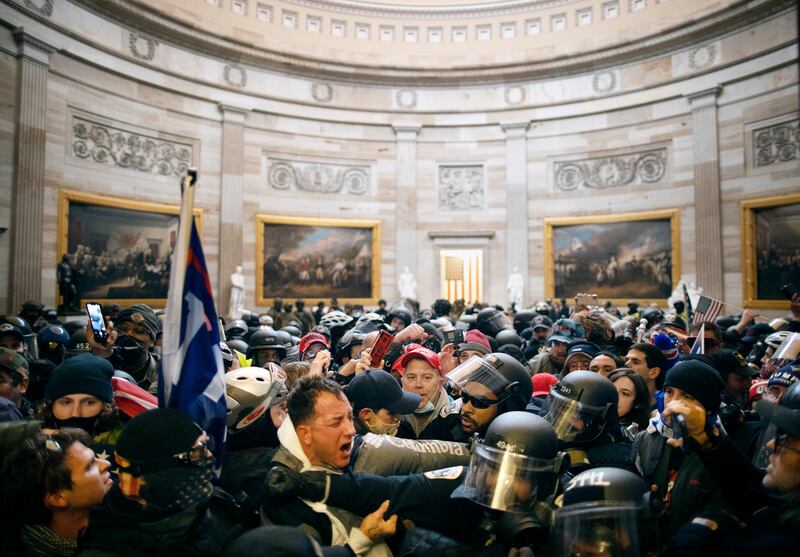 Police clash with supporters of US President Donald Trump