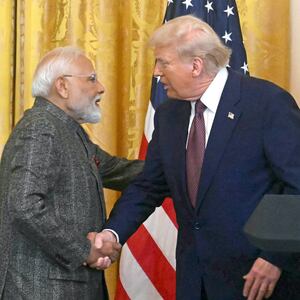 US President Donald Trump shakes hands with Indian Prime Minister Narendra Modi during a joint press conference in the East Room of the White House in Washington, DC, on February 13, 2025.