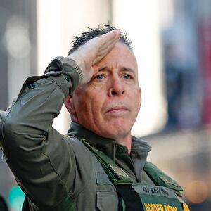 US Customs and Border Patrol Commander Gregory Bovino (C) leaves federal court at Dirksen Federal Building after his hearing in Chicago, Illinois, on October 28, 2025. Bovino was ordered to appear in federal court for violating a temporary restraining order issued by District Judge Sara Ellis that orders immigration enforcement agents to limit use of tear gas and other crowd-suppression items except when there is an imminent threat. (Photo by KAMIL KRZACZYNSKI / AFP) (Photo by KAMIL KRZACZYNSKI/AFP via Getty Images)
