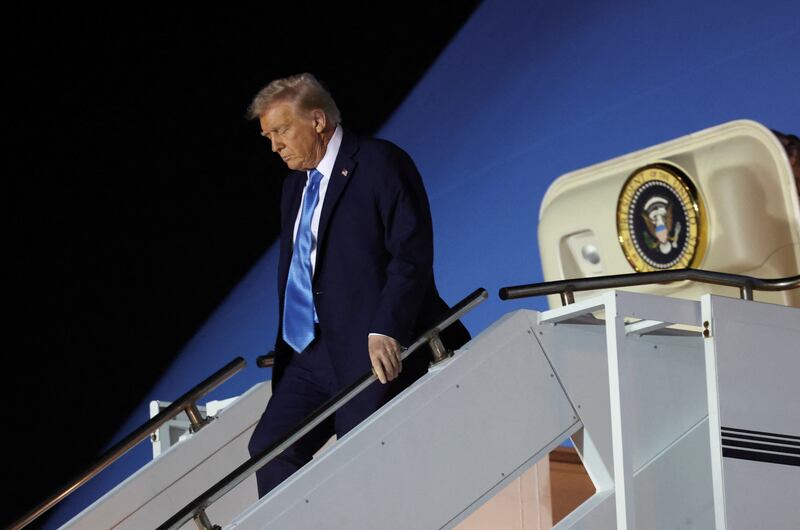 U.S. President Donald Trump steps down from Air Force One upon his arrival in West Palm Beach, Florida, U.S., January 31, 2025.