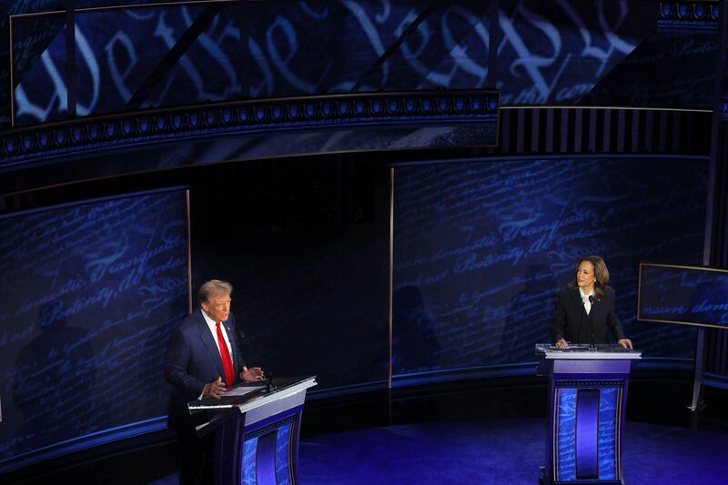 Donald Trump, left, and Kamala Harris attend presidential debate hosted by ABC in Philadelphia, Pennsylvania, U.S.,  Sept. 10, 2024.