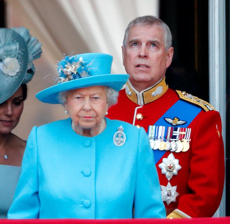 Queen Elizabeth II and Prince Andrew, Duke of York (wearing the uniform of Colonel of the Grenadier Guards) watch a flypast from the balcony of Buckingham Palace during Trooping The Colour, the Queen's annual birthday parade on June 9, 2018 in London, England. The annual ceremony involving over 1400 guardsmen and cavalry, is believed to have first been performed during the reign of King Charles II. The parade marks the official birthday of the Sovereign, even though the Queen's actual birthday is on April 21st. (Photo by Max Mumby/Indigo/Getty Images)