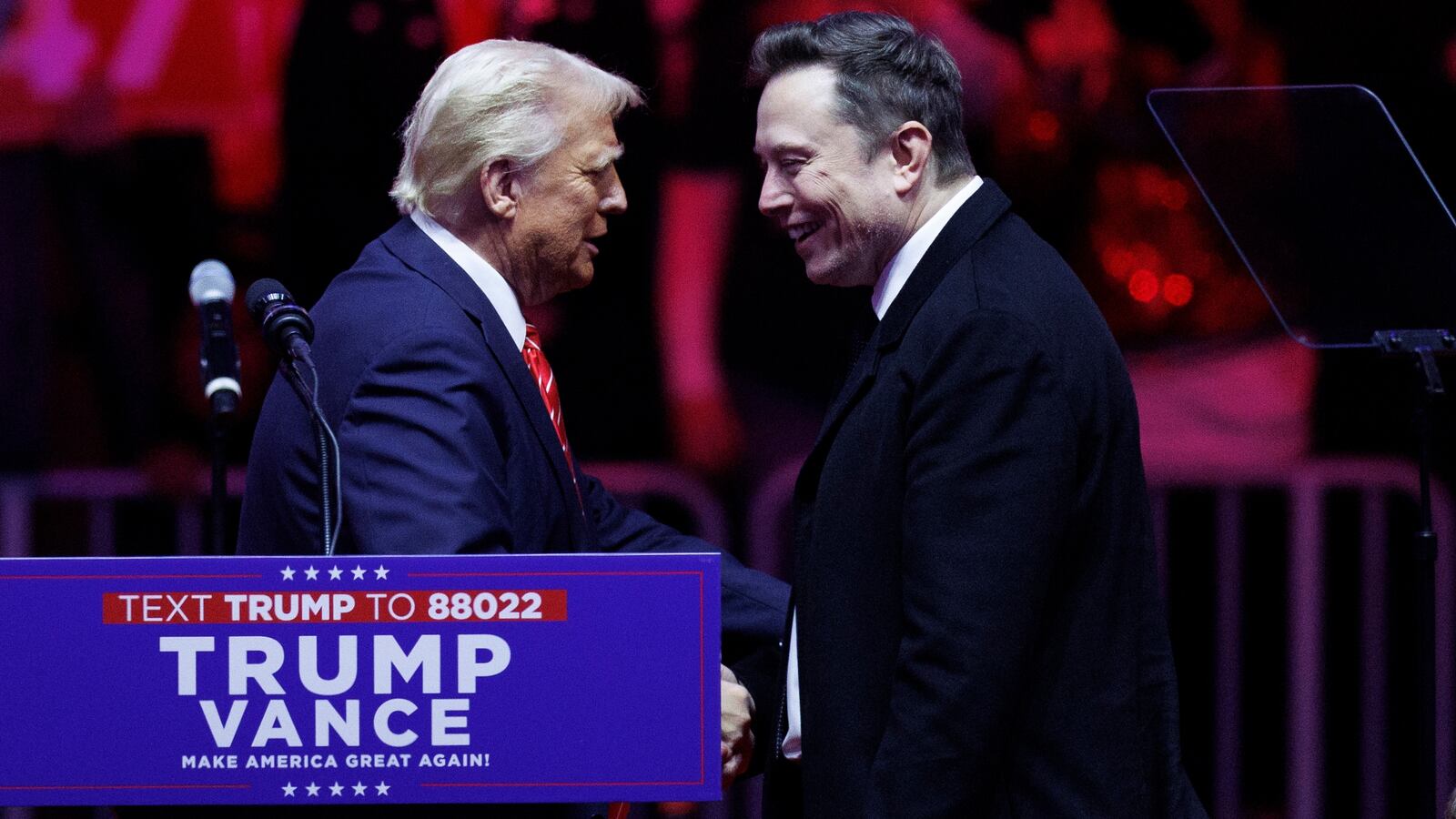 Elon Musk walks on stage with his son, X, beside President-elect Donald Trump during a rally at Capital One Arena in Washington, on January 19, 2025.