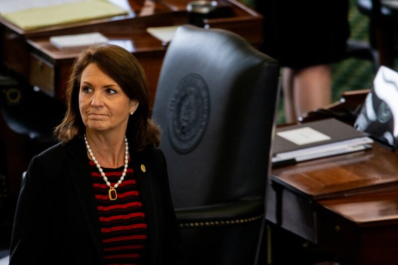 Angela Paxton was barred from voting during her husband's trial.