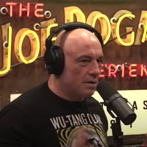 Joe Rogan speaks into a microphone during the latest episode of his podcast The Joe Rogan Experience.