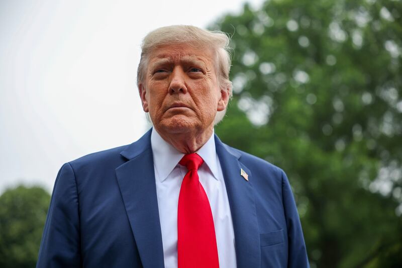 WASHINGTON, DC - JUNE 15: U.S. President Donald Trump stops and talks to the media before he boards Marine One on the South Lawn at the White House on June 15, 2025 in Washington, DC. The President will attend the annual meeting of the Group of 7 nations, Britain, Canada, France, Germany, Italy, Japan and the United States are taking place in the Canadian Rocky Mountains in Alberta, and will run until late Tuesday. (Photo by Tasos Katopodis/Getty Images)