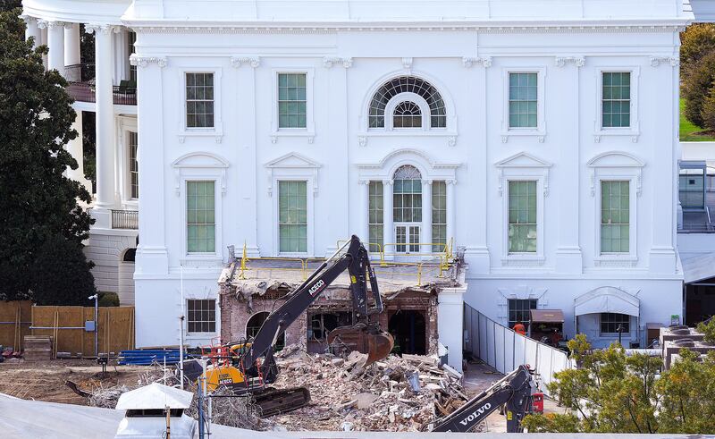An excavator works to clear rubble after the East Wing of the White House was demolished on October 23, 2025 in Washington, DC.