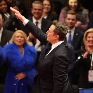 Elon Musk gestures as he speaks during an inauguration event at Capital One Arena on January 20, 2025 in Washington, DC.