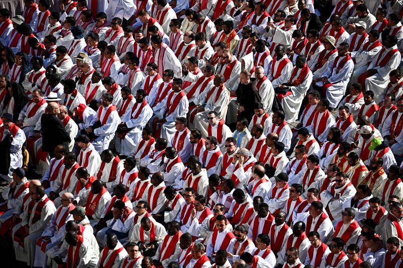 Members of the clergy gather, ahead of the funeral Mass of Pope Francis in St. Peter's Square at the Vatican, April 26, 2025.