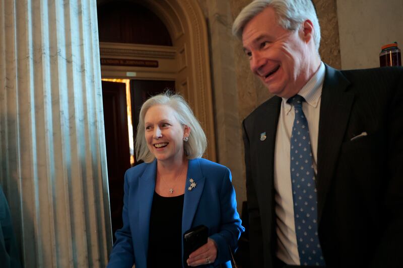 Sen. Kirsten Gillibrand (D-NY) shared a laugh with Sen. Sheldon Whitehouse (D-RI) as they leaft a caucus lunch on Thursday.