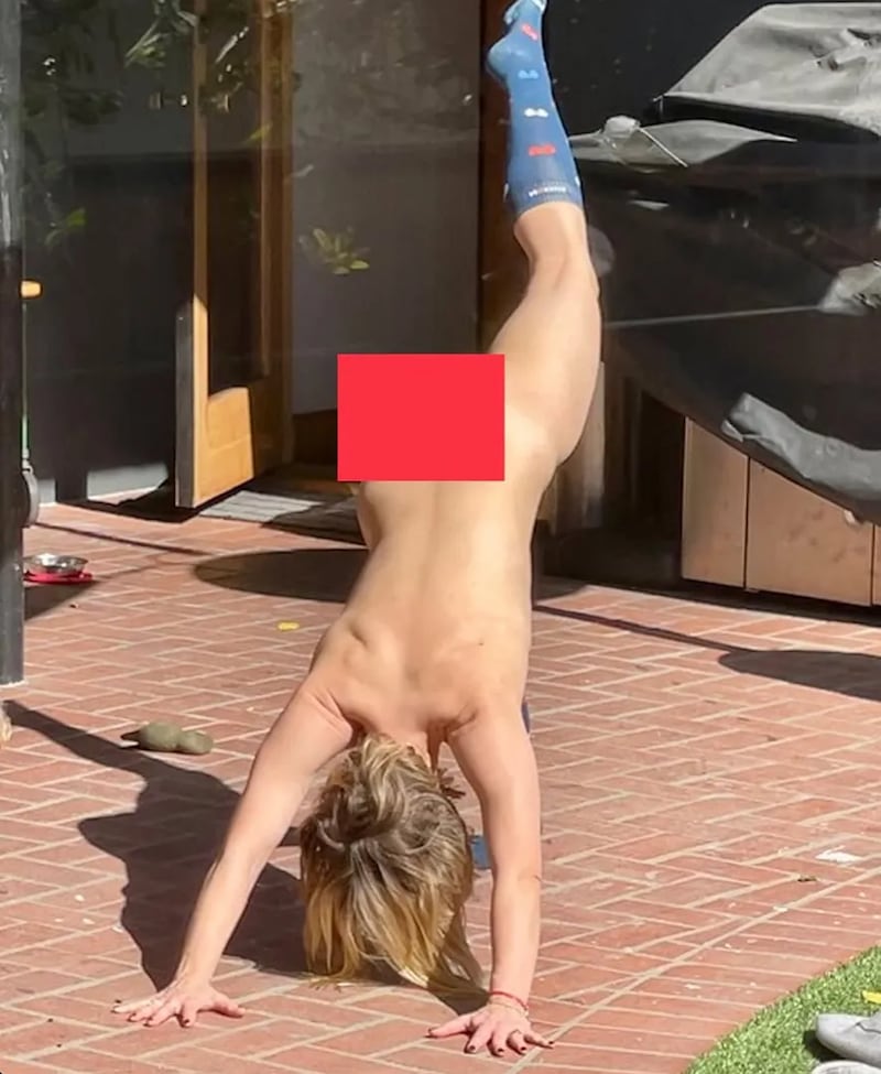 In his congratulatory Instagram post, Shepard, 50, celebrated the nod by posting an image of Bell in a downward dog yoga pose, wearing only knee-high socks.