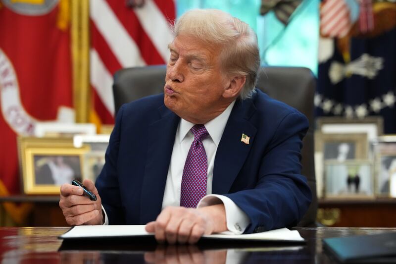 President Donald Trump signed executive orders in the Oval Office on September 05, 2025 included one to rename the Department of Defense the Department of War.