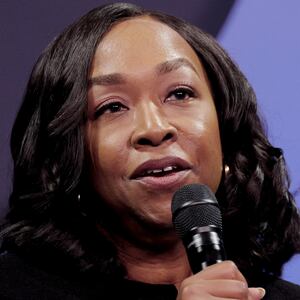 Shonda Rhimes holding a mic as she speaks at Clinton Global Initiative 2024