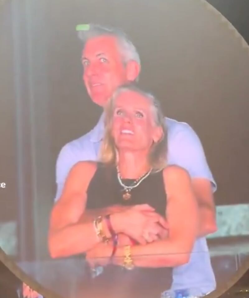 The two appeared to be having a good time before being placed on a Jumbotron at Gillette Stadium.