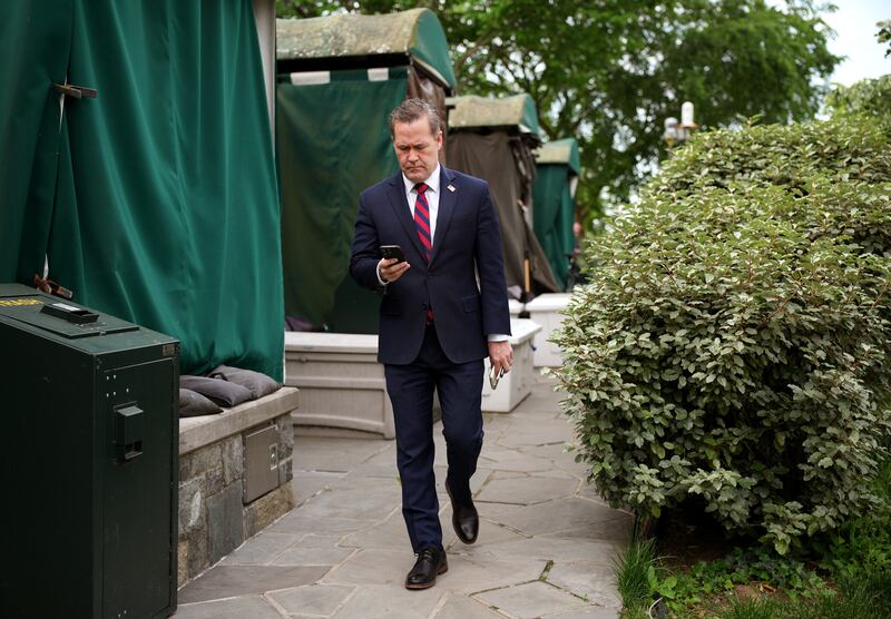 WASHINGTON, DC - MAY 01: National Security Advisor Michael Waltz looks at his phone as he prepares for a TV interview at the White House on May 01, 2025 in Washington, DC. This week marks the first 100 days of U.S. President Donald Trump's second term. (Photo by Andrew Harnik/Getty Images)