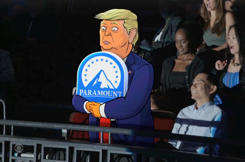 Trump clutching the Paramount logo
