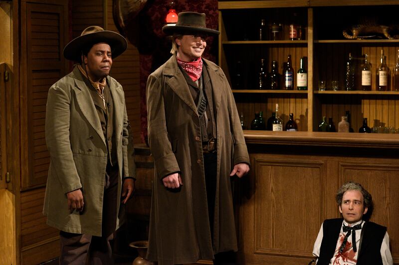 Kenan Thompson, host Elon Musk, and Kyle Mooney during the "Cowboy Standoff" sketch on Saturday Night Live on Saturday, May 8, 2021.