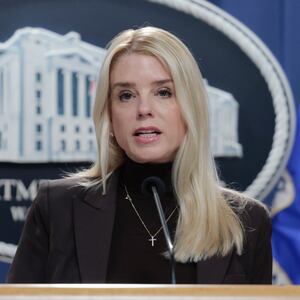 WASHINGTON, DC - FEBRUARY 12: U.S. Attorney General Pam Bondi arrives to a news conference at the Department of Justice Building on February 12, 2025 in Washington, DC. Bondi held the news conference to announce charges against the state of New York for failure to enforce federal immigration laws. Bondi was joined by Tammy Nobles (L) whose 20 year old daughter was murdered by an immigrant from El Salvador who was allegedly in the MS-13 gang. (Photo by Anna Moneymaker/Getty Images)